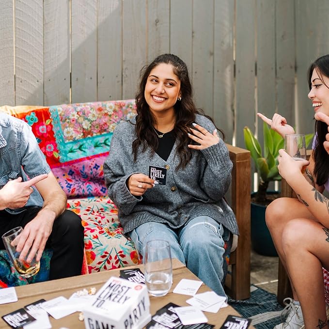 DSS Games Who's Most Likely to...Kinda Clean Family Edition [A Party Game | Great for Adults & Teens | Game Nights & Big Groups]