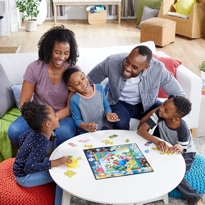 Monopoly Junior Super Mario Edition Board Game, Fun Kids' Ages 5 and Up, Explore The Mushroom Kingdom as Mario, Peach, Yoshi, or Luigi (Amazon Exclusive)