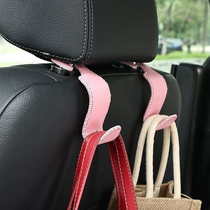 Amooca Car Seat Headrest Hook Universal Vehicle Storage Hanger Leather with Metal Car Seat Back Organizer for Handbag Purse Coat Pink 2 Pack